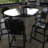 C75B - St. Maarten II Crossweave Vinyl Armless Patio Bar Chair - Lifestyle