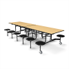 12 foot folding cafeteria table with Fusion Maple laminate top, 12 black stool seats, and commercial mobile steel frame for school lunchrooms