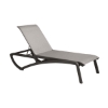 Sunset sling chaise lounge with gray sling fabric and dark resin frame for outdoor resort and pool areas