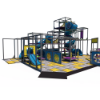 Side view indoor playground system with large tube slide, crawl tunnels, and interconnected elevated play platforms IP24123